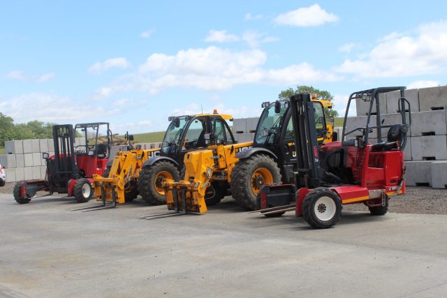 Forklifts and telehandlers at construction equipment hire yard