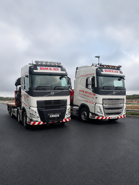 Block Aid UK lorries parked on roadside
