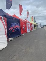 Motor racing team tents and flags at Silverstone