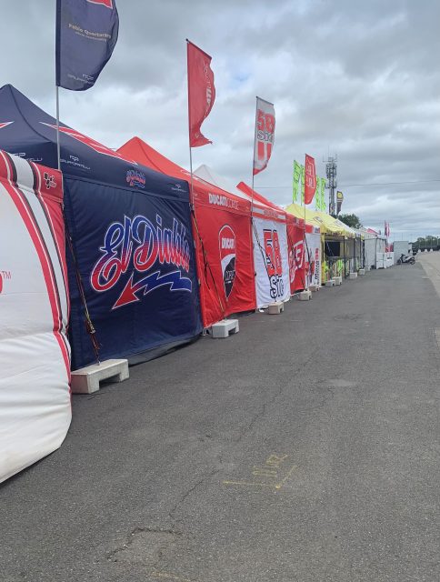 Motor racing team tents and flags at Silverstone
